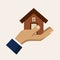 Hand holding a house, insurance service vector icon