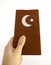 Hand Holding Islamic Book