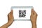 Hand holding isolated white tablet with QR code scan