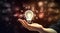 Hand holding light bulb and business digital marketing innovation technology icons on network