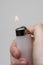 Hand holding a lighter