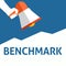 Hand Holding Megaphone With BENCHMARK Announcement