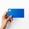 Hand holding mockup credit card on white background, by AI Generative