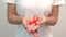Hand holding Orange Ribbon for Leukemia, Kidney cancer day, world Multiple Sclerosis, CRPS, Self Injury Awareness month.