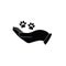 Hand holding paw icon. Animal care and protect