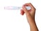 Hand holding pregnancy test positive. in her hand