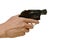 hand holding revolver gun and finger safety on trigger in white background