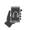 Hand holding smartphone glyph icon