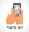 Hand holding a smartphone and sending traditional message for Jewish holiday Yom Kippur
