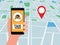 Hand holding smartphone. Taxi service application on a screen and location pointer on street map. Smart taxi service concept.