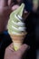 The hand is holding soft greentea iced-cream, Japan