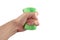 A hand (holding) squeezes green washing sponge for dishes