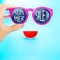 hand holding summer pink glasses with summer sale! word and watermelon at light blue background,Summer Holiday,Leave space for ad