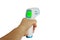 Hand holding Thermometer Gun Side View Medical Digital Non-Contact Infrared Sight Handheld Forehead Readings. Temperature