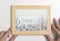 Hand holding travel japan Tokyo poster photo frame