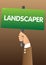 Hand holding up a banner with Landscaper text.