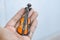 Hand holding violin miniature.copy space on the right for text