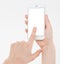 Hand holding white cellphone isolated on white clipping path inside. Online shopping. Top view. Mock up. Copy space. Template.Blan