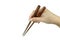 Hand holding wooden chopsticks handmade by rosewood on white background