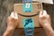 Hand holds amazon box