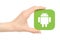 Hand holds Android logo