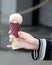 A Hand Holds an Ice Cream Cone, Symbolizing Indulgence