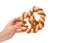 Hand holds knot-shaped biscuits