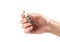 The hand holds an old iridium spark plug. Close up. Isolated on a white background