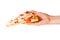 Hand holds piece of pizza isolated on white background