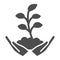 Hand holds small plant with many leaves solid icon, Ecology concept, sprout growing in ground sign on white background