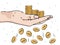 Hand holds stacks of coins. Losing coins. Depicts financial losses, reduced income, financial crisis