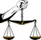 Hand of justice weighing scales