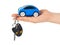 Hand with keys and car