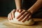 Hand kneading the dough