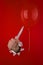 Hand with knife near balloon