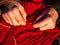 Hand knitting with woolen thread with knitting needles of warm clothes