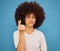 Hand, korean symbol and portrait of happy woman with an afro from Puerto Rico in the studio. Happiness, care and girl