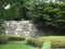 Hand Laid Stone Wall with Trees and Lawn
