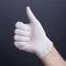 Hand in latex gloves, thumb up gesture