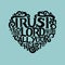 Hand lettering with bible verse Trust in the Lord with your heart on blue background.