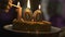 Hand lighting candles 100 on cake, company anniversary celebration, ceremony