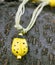 Hand made polymer clay yellow pendant