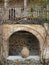 Hand Made Terracotta Urn Under Stone Arch, Greece