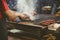 Hand making delicious meat on the griddle to make street food in the market of the Medina of Beni Mellal-Jenifra