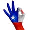 Hand making Ok sign, Chile flag painted as symbol of best quality, positivity and success