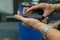 A hand of man practicing firing using a Glock gun model at the shooting range. Fire glock hand gun. man`s hands loading a pistol