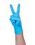 Hand of a medic wearing a blue latex gloves