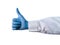 Hand of a medical worker shows thumb up on white isolated background. Hand gestures. Close-up Of A Hand Showing Thumb Up