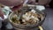 Hand mixing eel claypot baked rice Chinese Cantonese summer energy dish