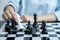 Hand move chess with strategy and tactic to win enemy, play battle on board game, business opportunity  competition strategic